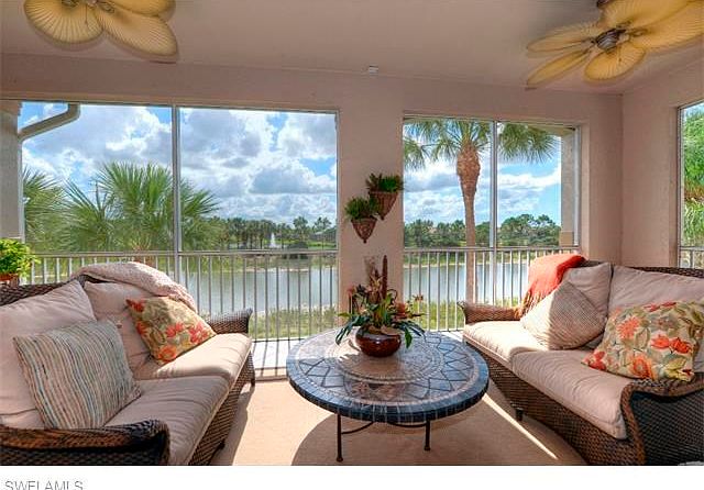 Lanai with beautiful fountain, lake and golf views.