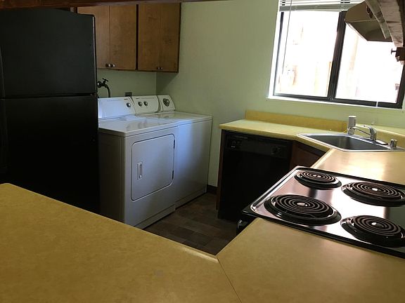 Kitchen with Full-Sized Washer and Dryer