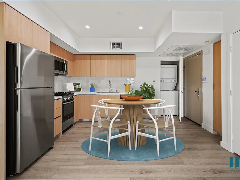 Open-Concept Kitchen with In-Suite Washer & Dryer - Pacific Floor Plan