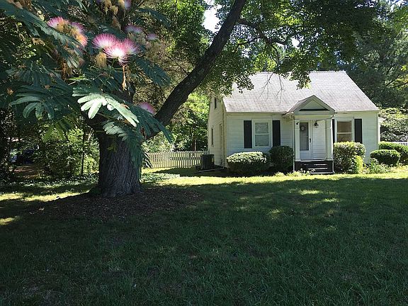 Front of house, mimosa  