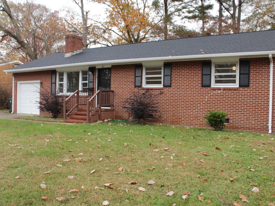 Front view of the home with an attached garage.