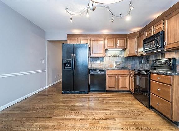 Another view of the Kitchen with doorway leading to living room.