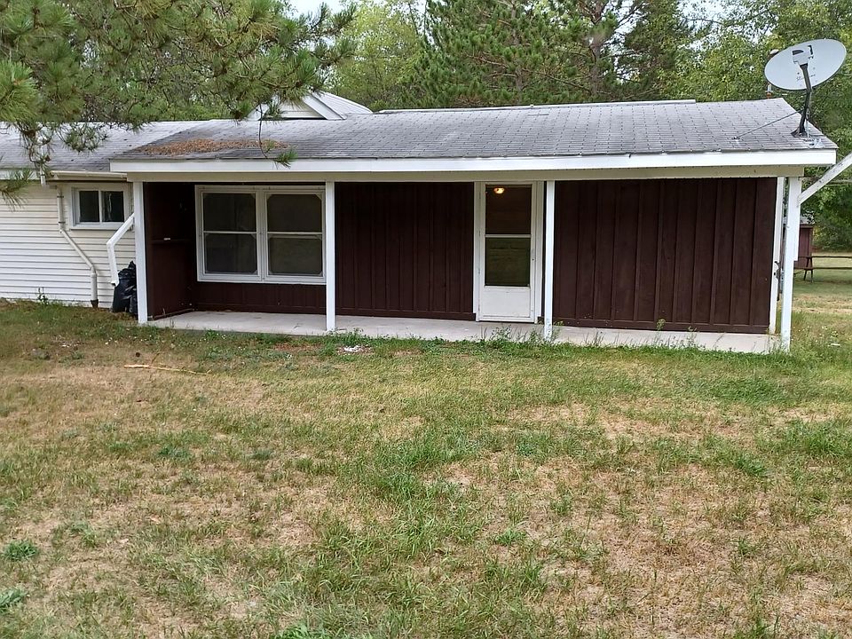 covered porch with main entrance into home