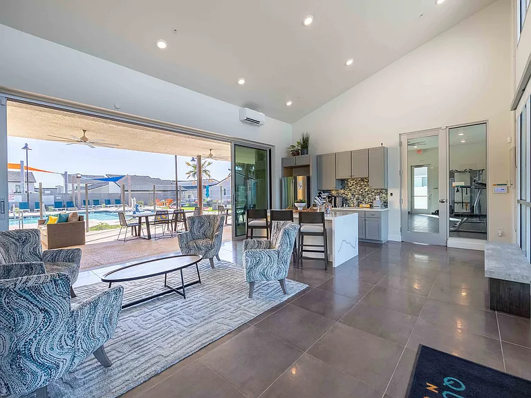 Experience luxury and comfort in this open and airy living space with seamless indoor-outdoor flow.