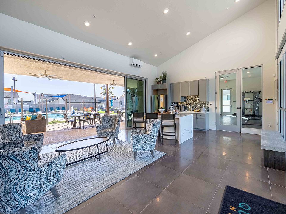 Experience luxury and comfort in this open and airy living space with seamless indoor-outdoor flow.