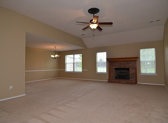Carpeted floors and ceiling fan