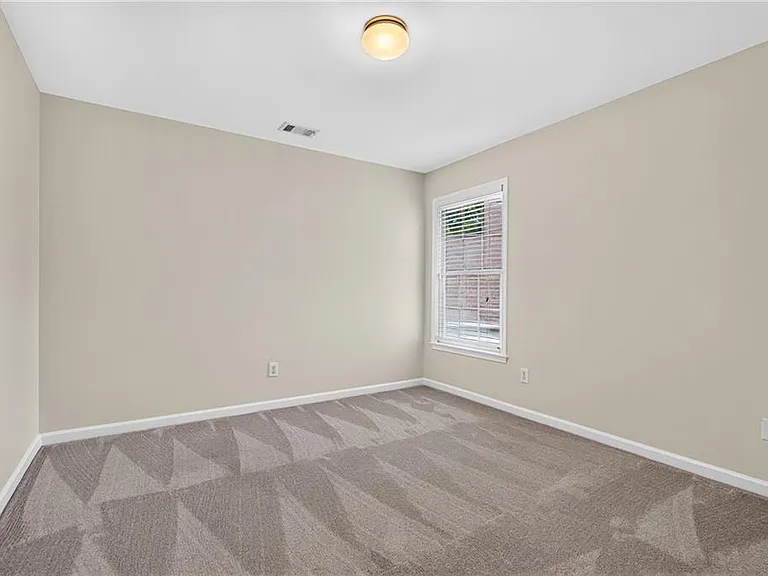 2311 Ravinia Ct NE — Photo 25