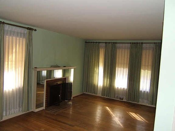 Wood burning fireplace and hardwood floors