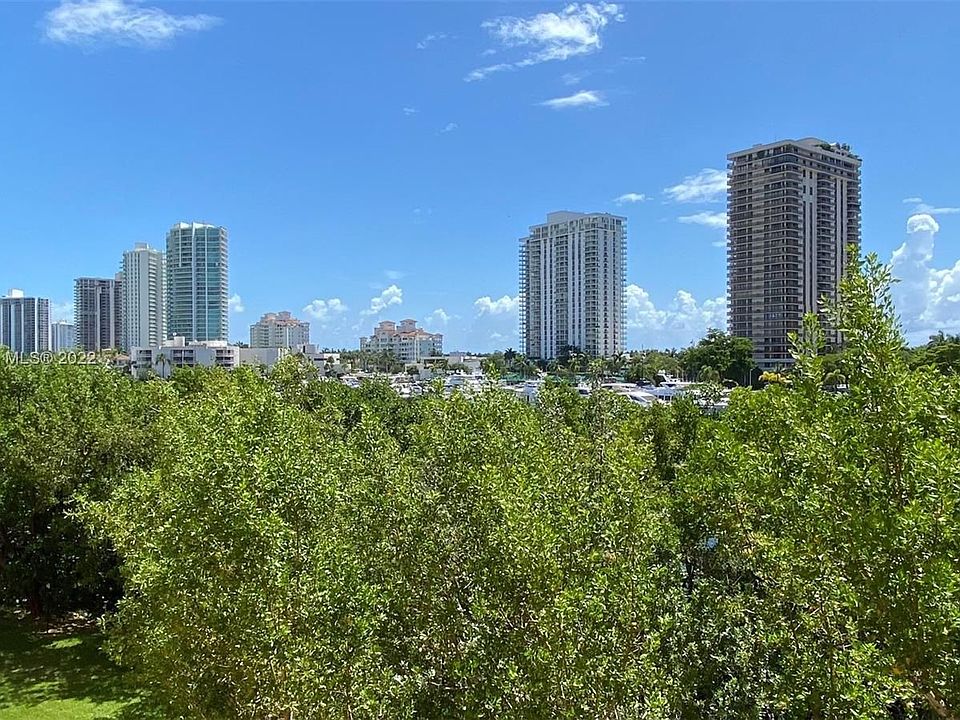 1st image of 19601 E Country Club Dr #7404