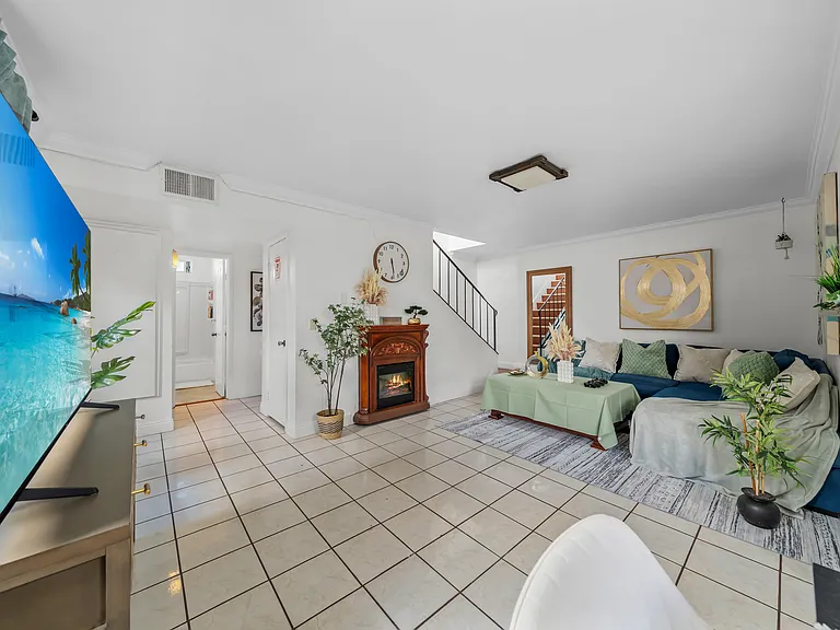 A living area packed with pillows, inviting you to relax and unwind!
