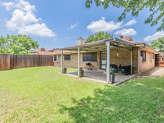 What a great backyard. Plenty of room for a playset, tossing the ball around or even a pool.
