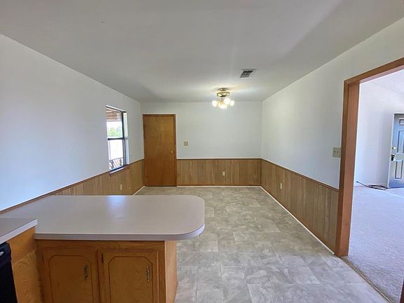 5th image of 8818 Farm Road 69 N