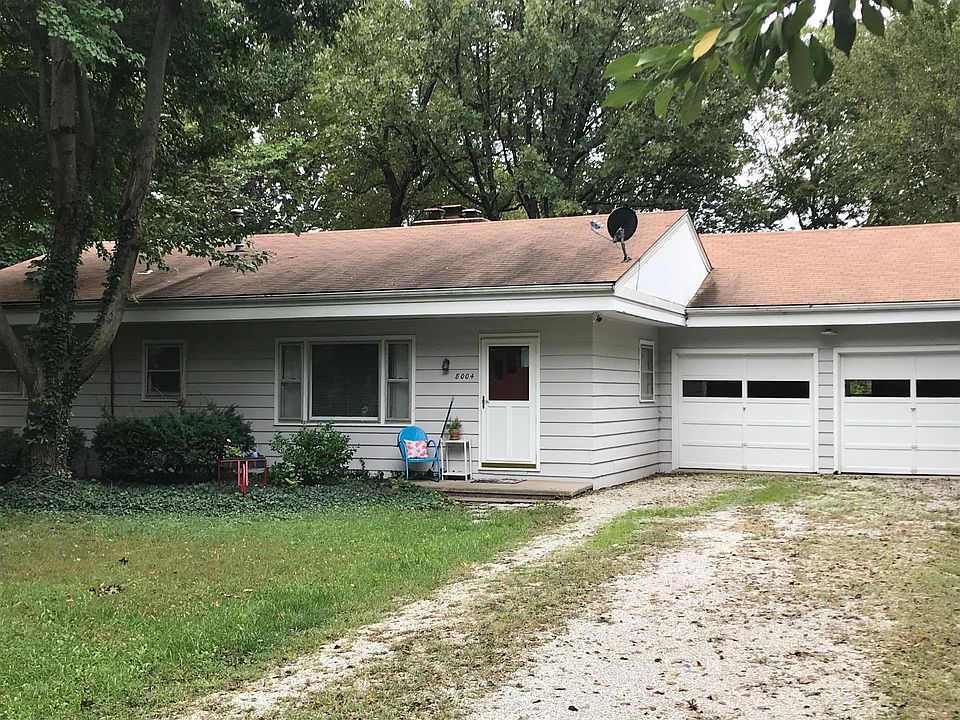 Front of house; two-car garage.