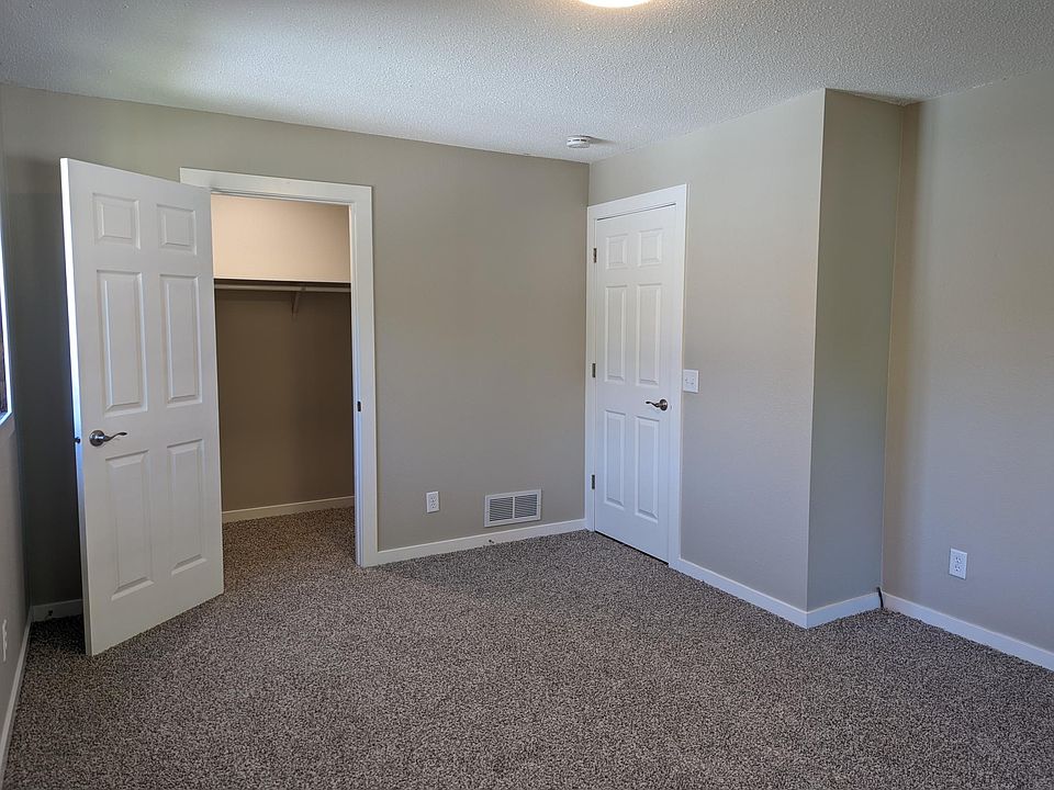 Master bedroom with view of walk in closet.