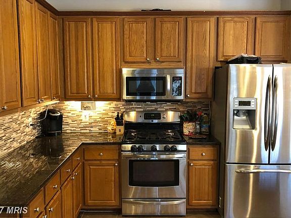 Spacious Kitchen with under cabinet lighting