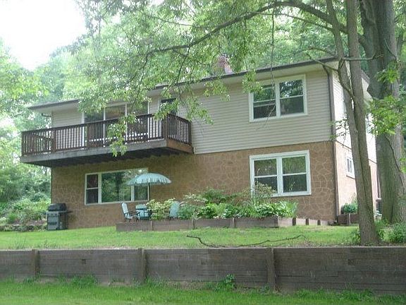 Back of house.  Walkout on both sides.