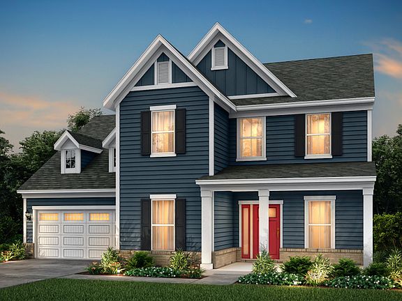Northridge Exterior LC2G features siding, brick accents and covered front porch.