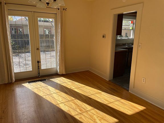 Dining room leading to kitchen