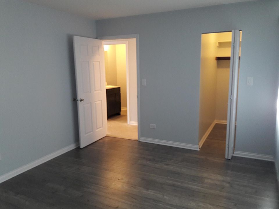 Bedroom with walk in closet