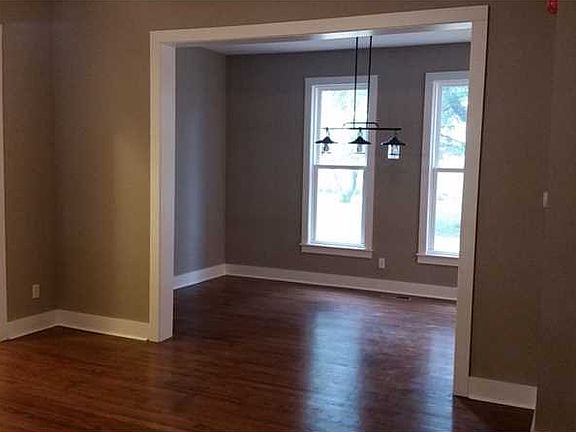 Dining Room. Living room flows into dining area... Lots of natural light!