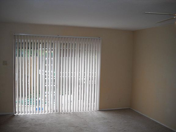  Fenced back yard area leading to car port