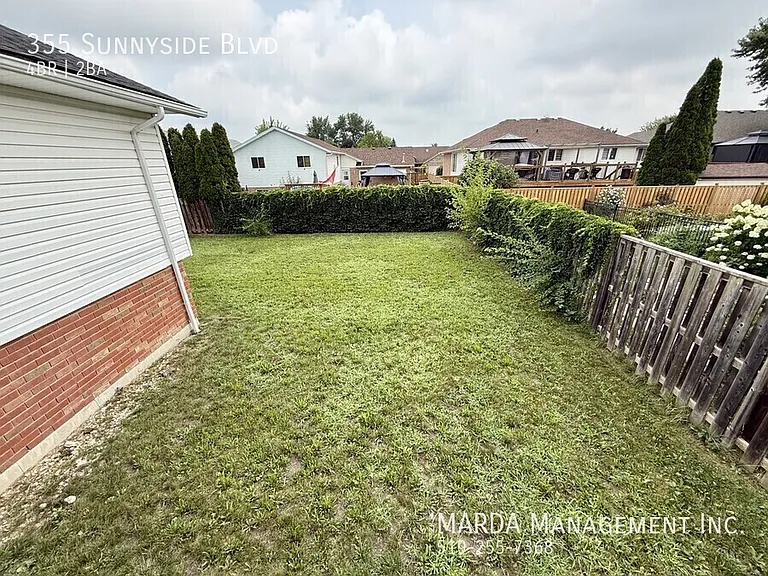 355 Sunnyside Blvd — Photo 20