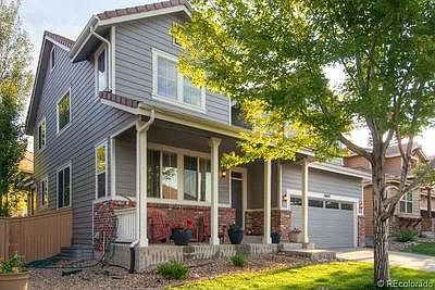 Wonderful front patio with brick accents