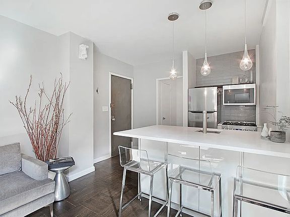 2nd image of 63 E 9th St APT 3E