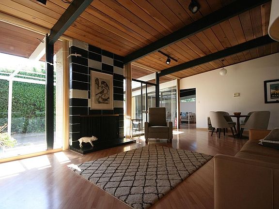 Living room (with furniture) - note that fireplace is now painted black