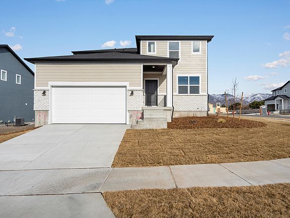 The Bryce floorplan exterior image taken at a Meritage Homes Community in Tooele, UT.