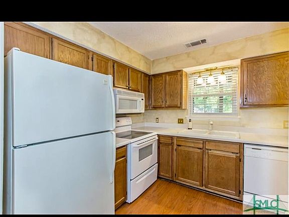 Kitchen furnished with appliances