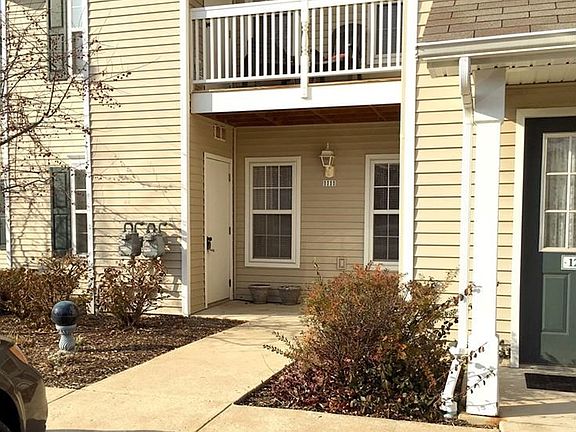Exterior view of the unit.  Parking is available right outside the suite or use the detached dedicated garage space around the back of the building.
