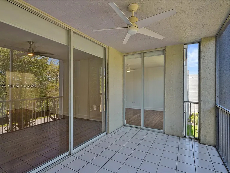 9725 NW 52nd St #406 — Photo 26