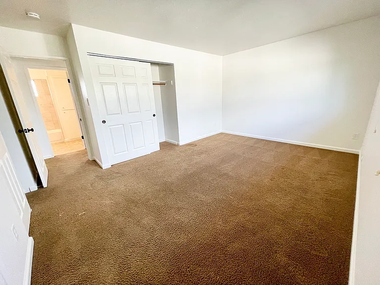 Spacious primary suite with two walk in closets!