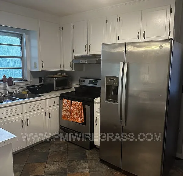 203 Meadowbrook Dr — Photo 2