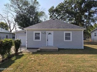 102 S College, Liberal, MO 64762
