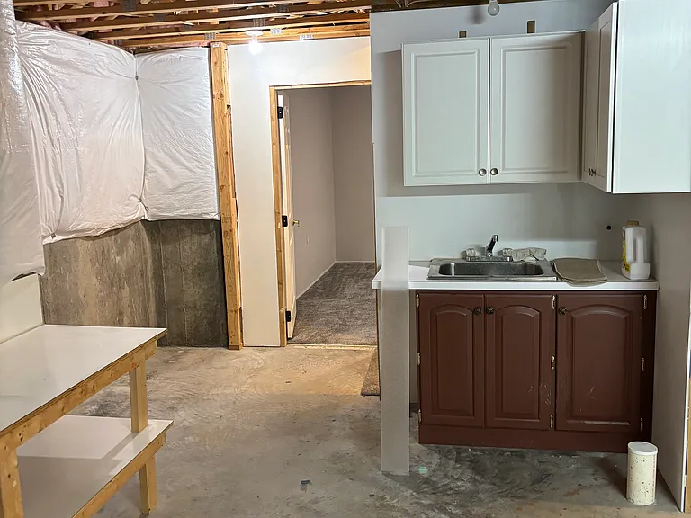 Unfinished section of basement
