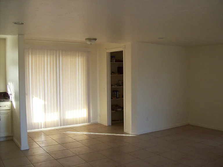 Pantry with Laundry and Slider to Outside Patio