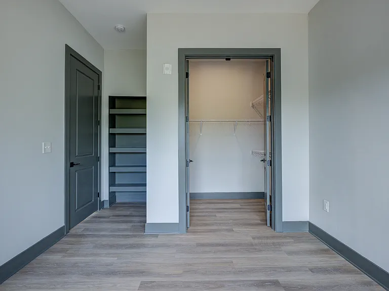 Bedroom with Built-In Shelving
