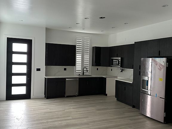 Downstairs Living space with kitchen pictured
