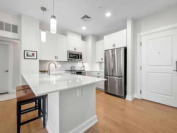 2nd image of 65 Washington St #Penthouse 11