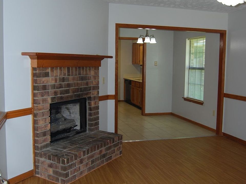 Gas-burning logs in fireplace