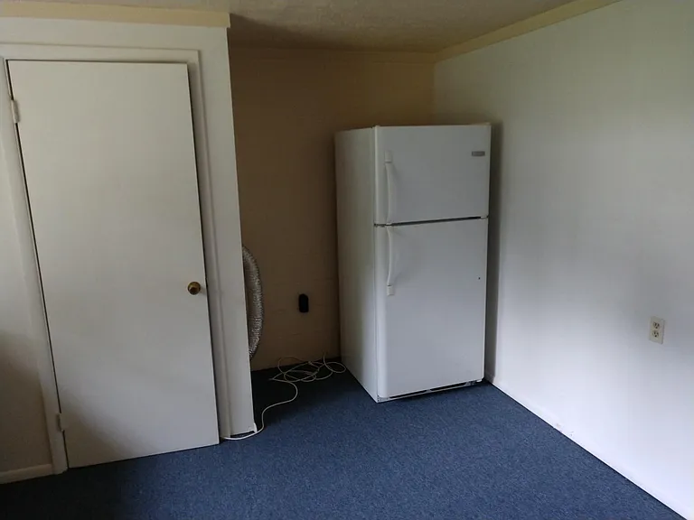 kitchen pantry, washer/dryer hook up area, refrigerator