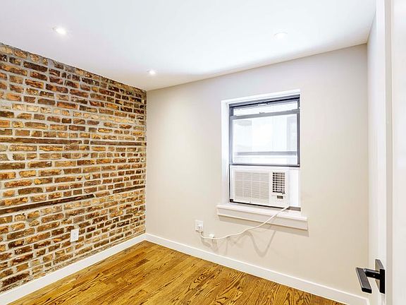 4th image of 215 E 3rd St APT 1