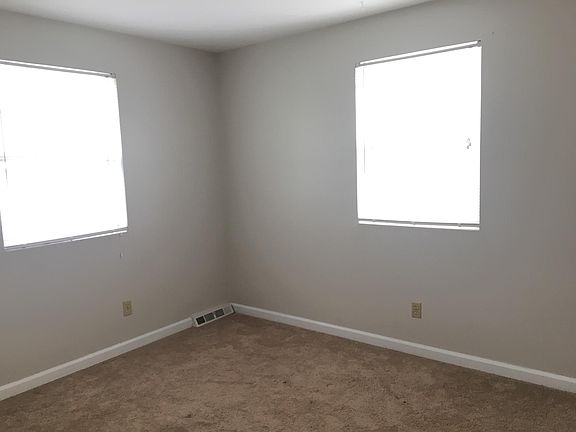 smaller of the two bedrooms est dimensions 10x11