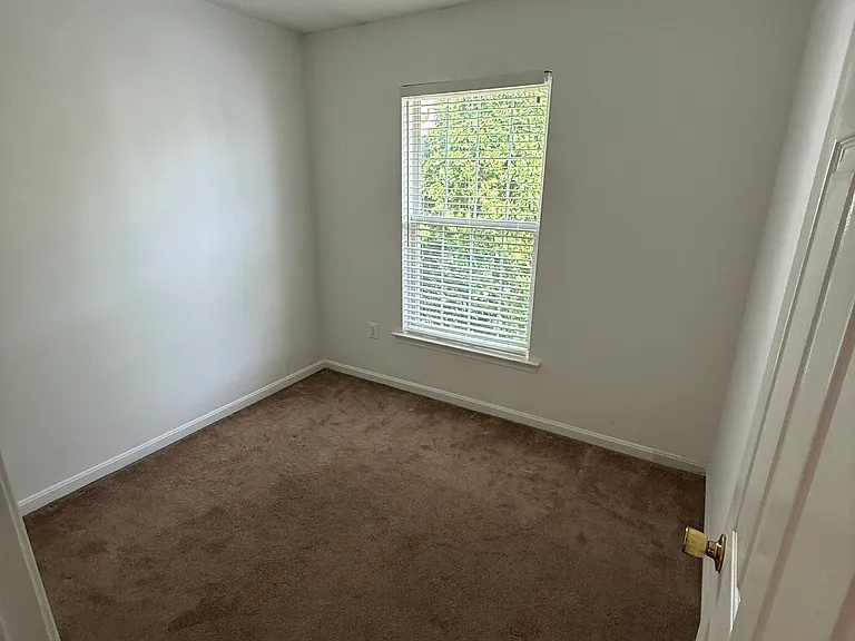 Another bedroom upstairs with closet