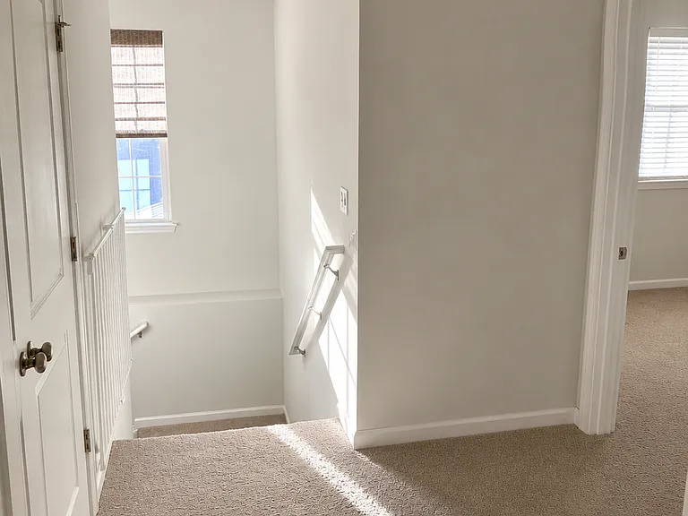 Top of stairs, bedroom to the right, laundry room on the left