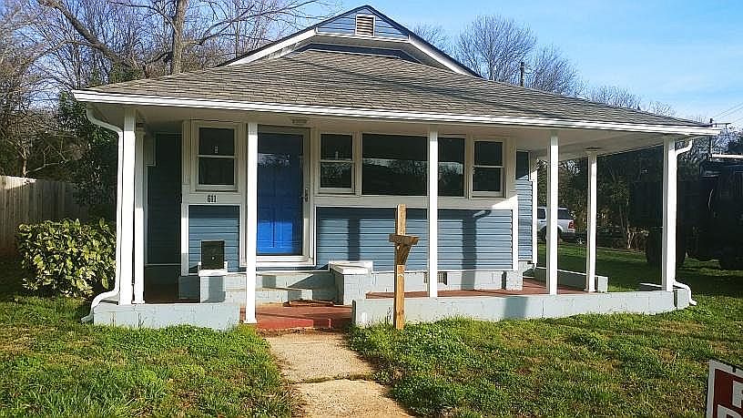 The house with the blue door...across from CVS and Wing King