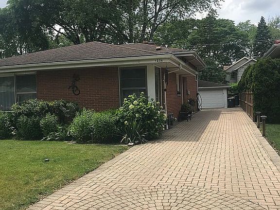 Driveway to garage and yard