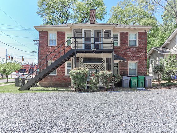Exterior of quadplex from Parking Area